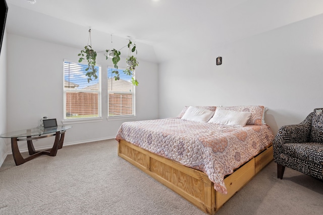 716 Emmons Creek St, Justin, TX 76247 - bedroom with vaulted ceiling, carpet floors, and baseboards