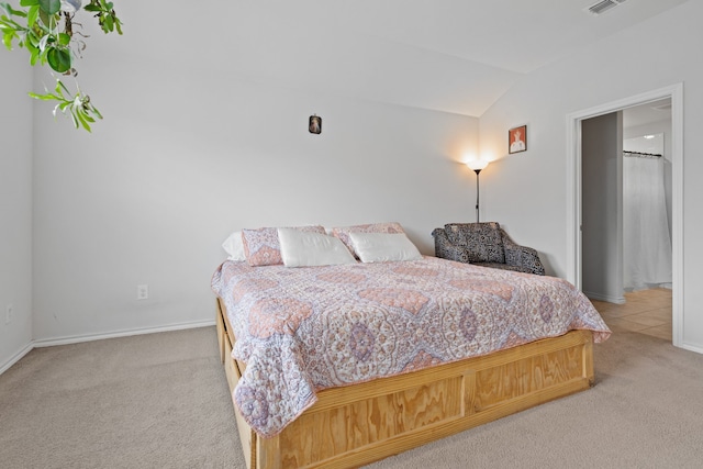 716 Emmons Creek St, Justin, TX 76247 - bedroom with baseboards, light colored carpet, and vaulted ceiling