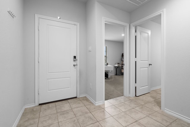 716 Emmons Creek St, Justin, TX 76247 - entryway featuring light tile patterned flooring and baseboards
