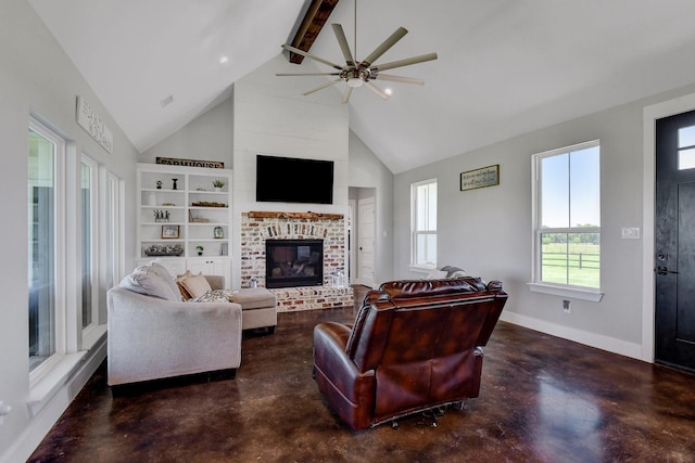 living room featuring concrete floors, a ceiling fan, a brick fireplace, baseboards, and beamed ceiling