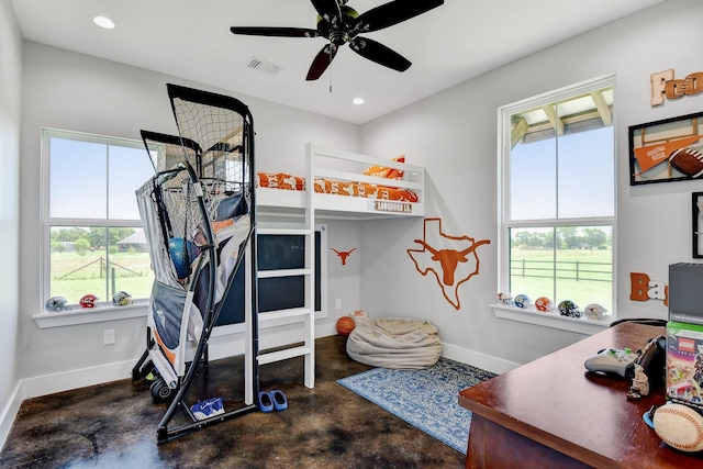 bedroom with concrete floors, recessed lighting, baseboards, and visible vents