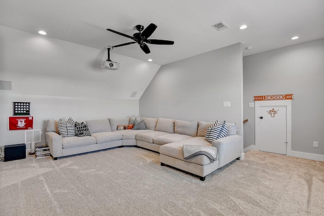 carpeted living room featuring lofted ceiling, visible vents, recessed lighting, a ceiling fan, and baseboards