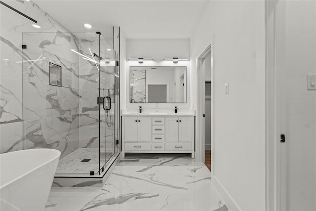 full bathroom with marble finish floor, vanity, a marble finish shower, recessed lighting, and a freestanding bath