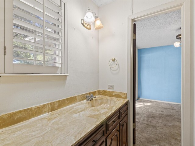 113 Delmore Dr, Hillsboro, TX 76645 - bathroom with vanity and a textured ceiling