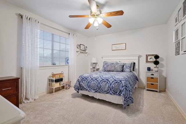 5125 Golden Ln, Fort Worth, TX 76123 - carpeted bedroom with baseboards and ceiling fan