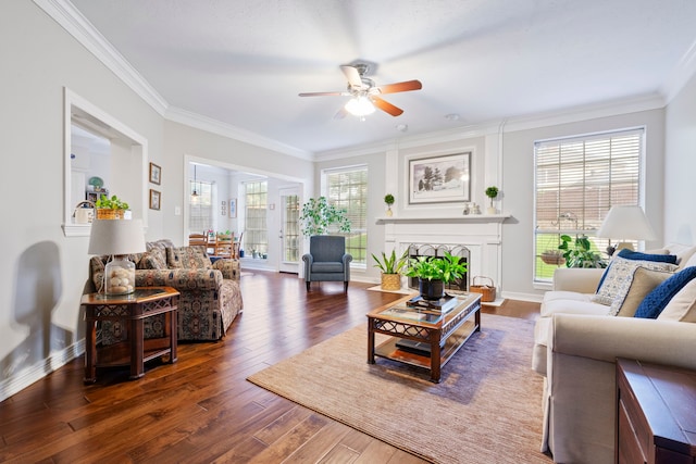 5125 Golden Ln, Fort Worth, TX 76123 - living room featuring crown molding, ceiling fan, plenty of natural light, and wood finished floors