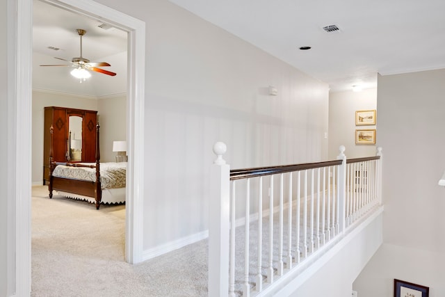 5125 Golden Ln, Fort Worth, TX 76123 - corridor featuring visible vents, an upstairs landing, ornamental molding, and carpet floors