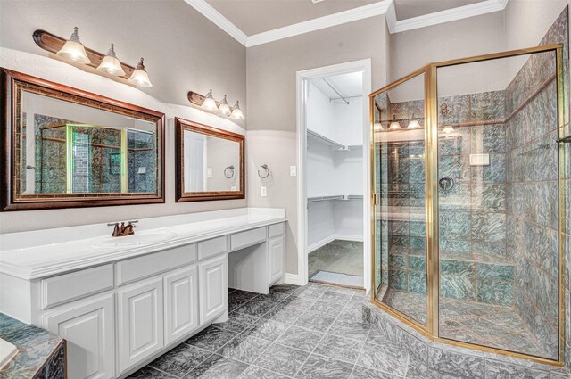 4600 Winter Park Dr, Richardson, TX 75082 - bathroom featuring a stall shower, crown molding, vanity, a walk in closet, and tile patterned flooring