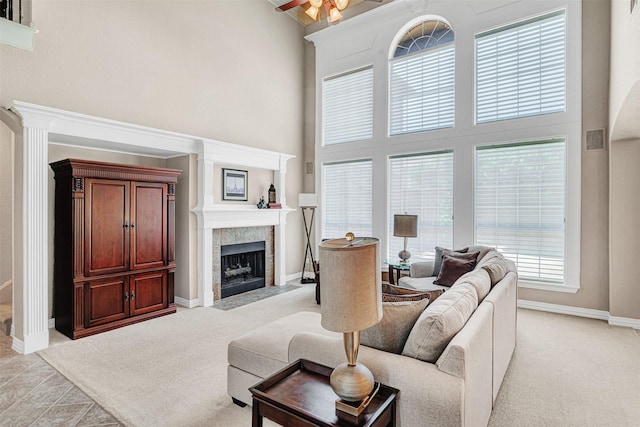 4600 Winter Park Dr, Richardson, TX 75082 - living area with a high ceiling, a premium fireplace, and baseboards
