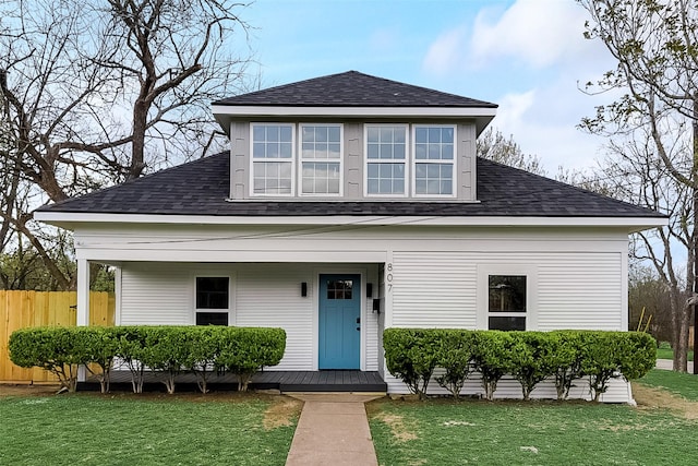 807 Florence St, Mckinney, TX 75069 - bungalow-style house featuring covered porch, roof with shingles, fence, and a front yard