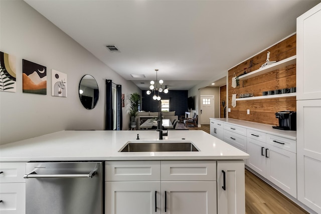 807 Florence St, Mckinney, TX 75069 - kitchen with an inviting chandelier, a sink, open shelves, visible vents, and dishwasher