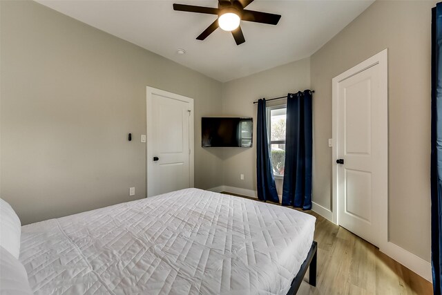 807 Florence St, Mckinney, TX 75069 - bedroom featuring light wood-style flooring, baseboards, and a ceiling fan