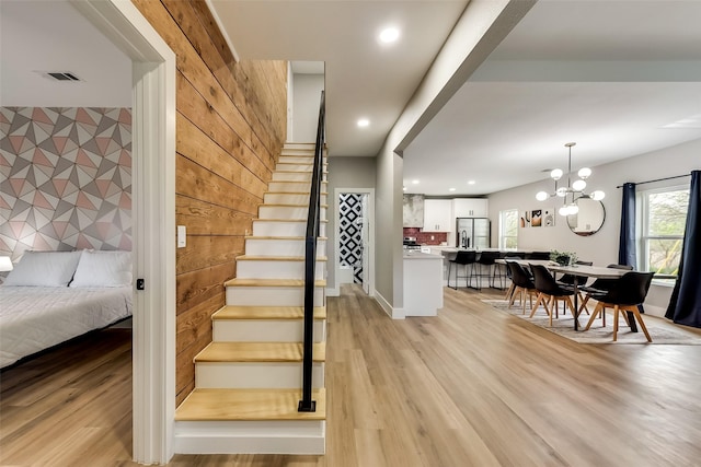 807 Florence St, Mckinney, TX 75069 - staircase with recessed lighting, a notable chandelier, visible vents, and wood finished floors