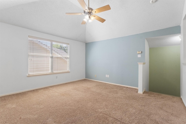 304 E Clover Park Dr, Fort Worth, TX 76140 - carpeted spare room with vaulted ceiling, ceiling fan, a textured ceiling, and baseboards