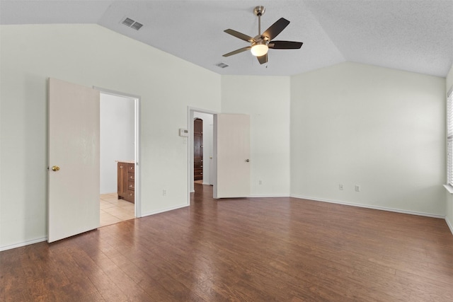 304 E Clover Park Dr, Fort Worth, TX 76140 - interior space with lofted ceiling, ensuite bath, visible vents, and wood finished floors