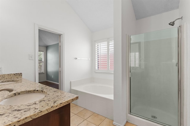 304 E Clover Park Dr, Fort Worth, TX 76140 - full bath with a garden tub, tile patterned floors, a shower stall, vaulted ceiling, and vanity