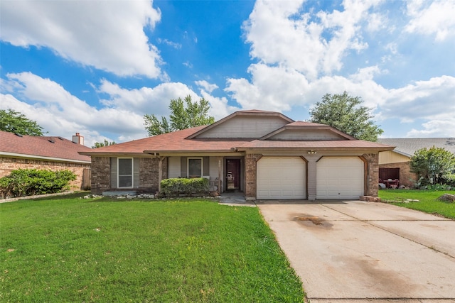 view of front of house featuring brick siding, a garage, a front lawn, and concrete driveway