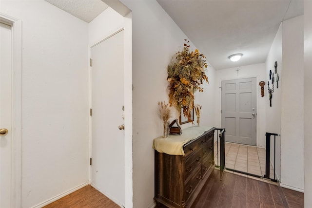 hall with wood finished floors and wine cooler
