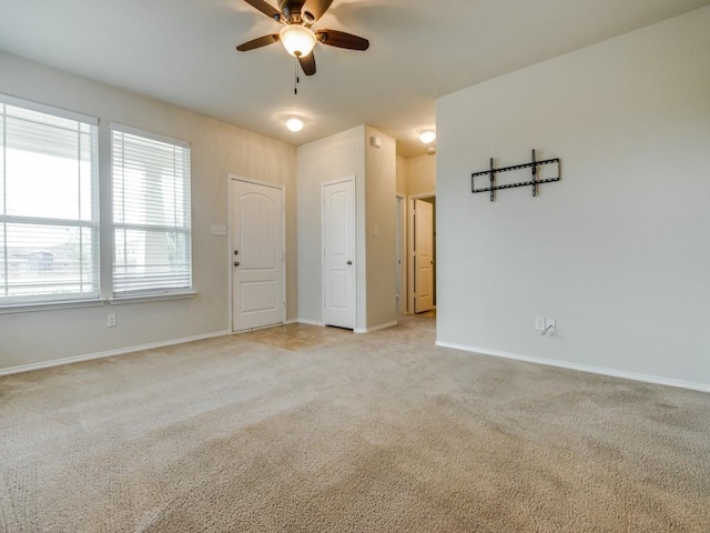 1909 Myers Ct, Providence Village, TX 76227 - unfurnished room featuring a ceiling fan, baseboards, and light colored carpet