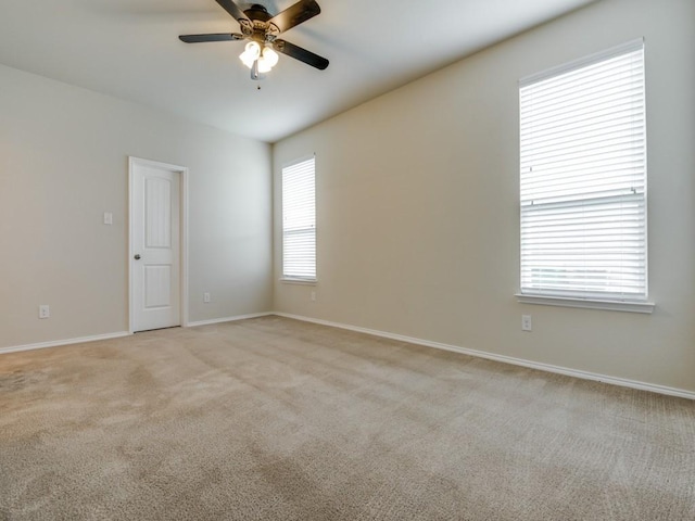 1909 Myers Ct, Providence Village, TX 76227 - empty room featuring light carpet, baseboards, and ceiling fan