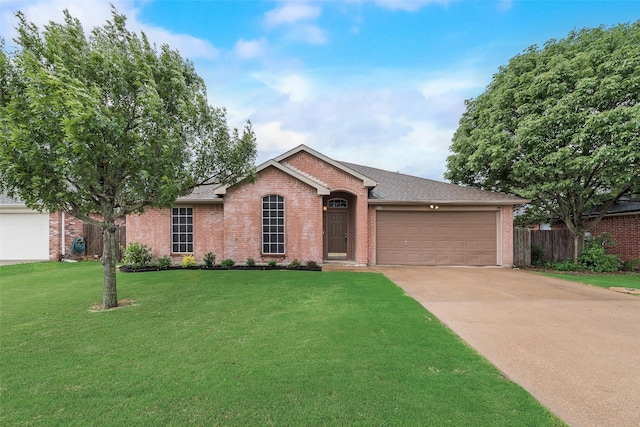 single story home with a front lawn, brick siding, driveway, and an attached garage