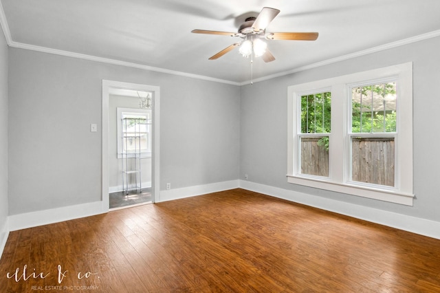 741 Vine St, Abilene, TX 79602 - spare room featuring healthy amount of natural light, a ceiling fan, ornamental molding, dark wood finished floors, and baseboards