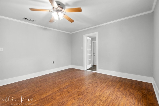 741 Vine St, Abilene, TX 79602 - spare room featuring crown molding, a ceiling fan, baseboards, and dark wood finished floors
