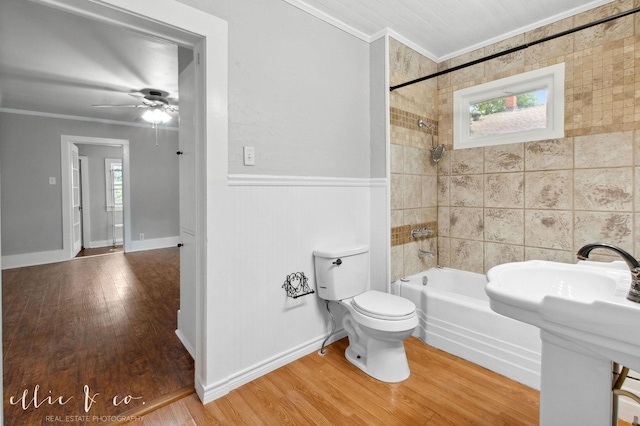 741 Vine St, Abilene, TX 79602 - full bath featuring ornamental molding, toilet, shower / bath combination, wood finished floors, and a ceiling fan
