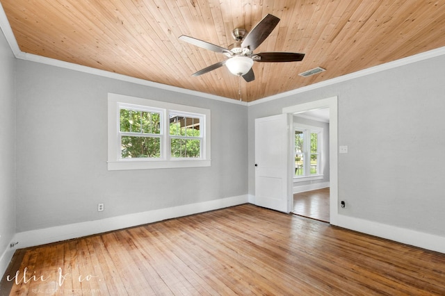 741 Vine St, Abilene, TX 79602 - unfurnished room featuring healthy amount of natural light, crown molding, baseboards, wood ceiling, and a ceiling fan