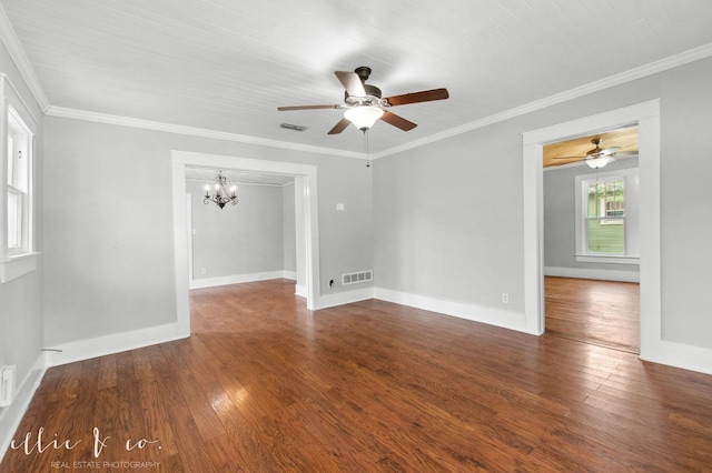 741 Vine St, Abilene, TX 79602 - unfurnished room with ceiling fan, a chandelier, wood finished floors, crown molding, and baseboards