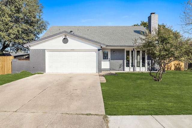 ranch-style house featuring an attached garage, a chimney, concrete driveway, a front yard, and brick siding