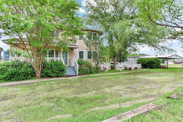 7634 Preston Rd, Denison, TX 75020 - view of front facade with a front lawn and a porch