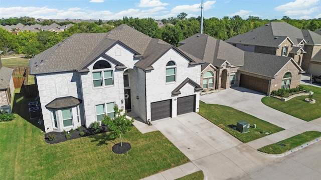 2506 Chalmers Rd, Glenn Heights, TX 75154 - french provincial home featuring driveway, a garage, a residential view, a shingled roof, and brick siding
