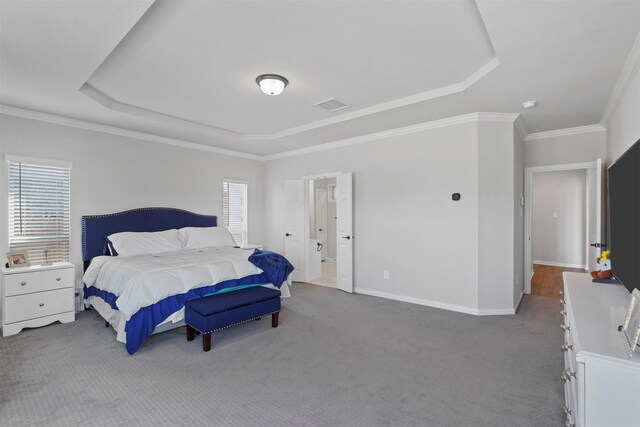 2506 Chalmers Rd, Glenn Heights, TX 75154 - carpeted bedroom with a raised ceiling, baseboards, and ornamental molding