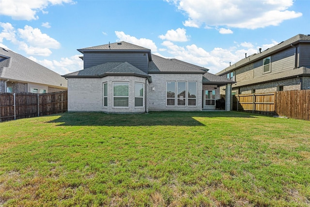2506 Chalmers Rd, Glenn Heights, TX 75154 - rear view of house featuring roof with shingles and brick siding