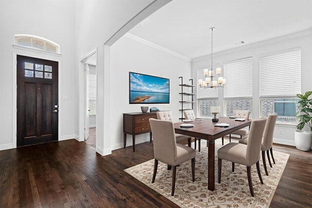 2507 Lavaca Dr, Euless, TX 76039 - dining space with a chandelier, plenty of natural light, dark wood-style floors, ornamental molding, and baseboards