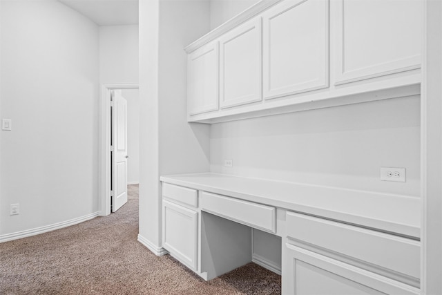 2507 Lavaca Dr, Euless, TX 76039 - unfurnished office with light colored carpet, built in study area, and baseboards