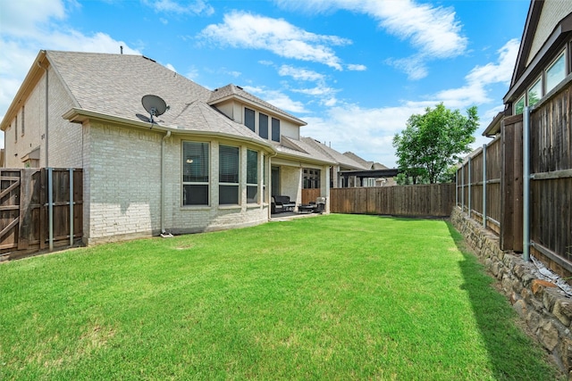 2507 Lavaca Dr, Euless, TX 76039 - back of house with brick siding, a shingled roof, and a patio