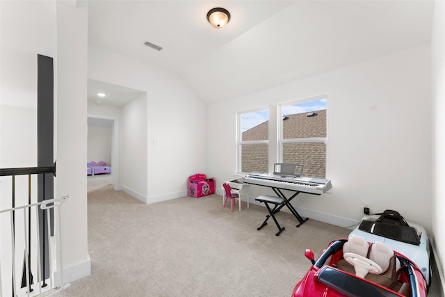 playroom with carpet flooring, visible vents, baseboards, and lofted ceiling