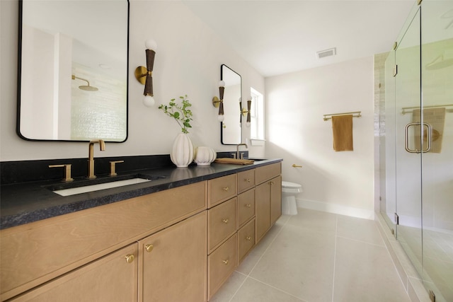 4508 Thunder Rd, Dallas, TX 75244 - full bath featuring double vanity, tile patterned flooring, a stall shower, toilet, and baseboards