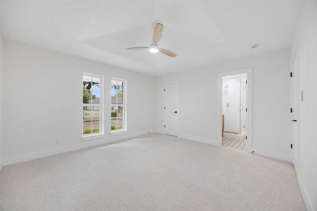 4508 Thunder Rd, Dallas, TX 75244 - unfurnished bedroom featuring light carpet, baseboards, ensuite bath, and a ceiling fan