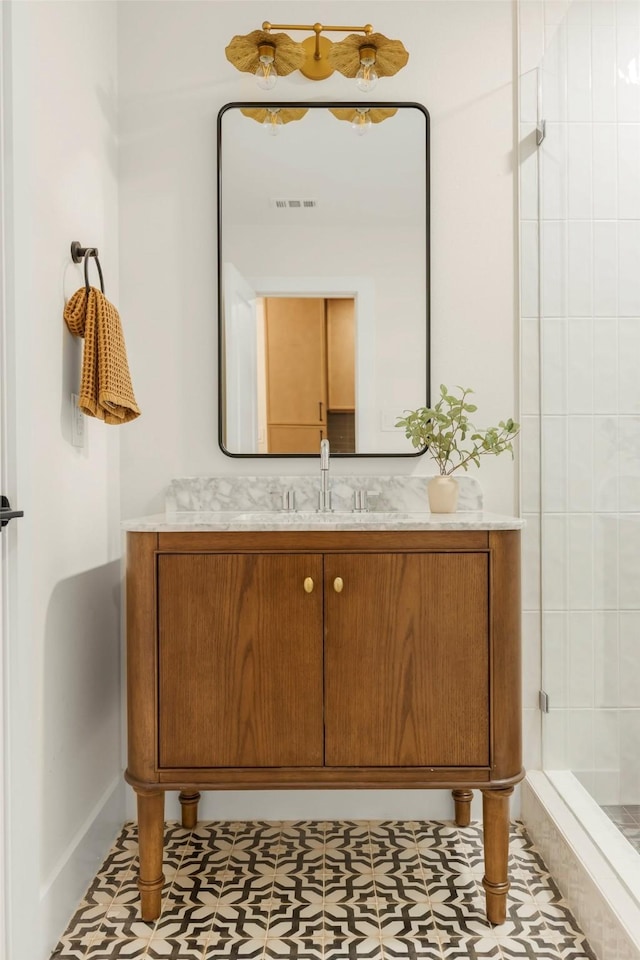 4508 Thunder Rd, Dallas, TX 75244 - full bathroom with a tile shower, vanity, and baseboards
