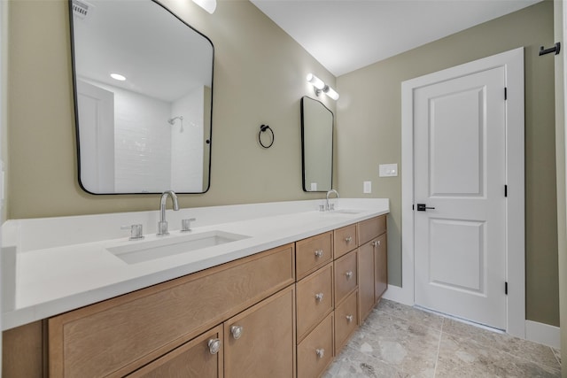 4508 Thunder Rd, Dallas, TX 75244 - full bath featuring double vanity, baseboards, and a shower