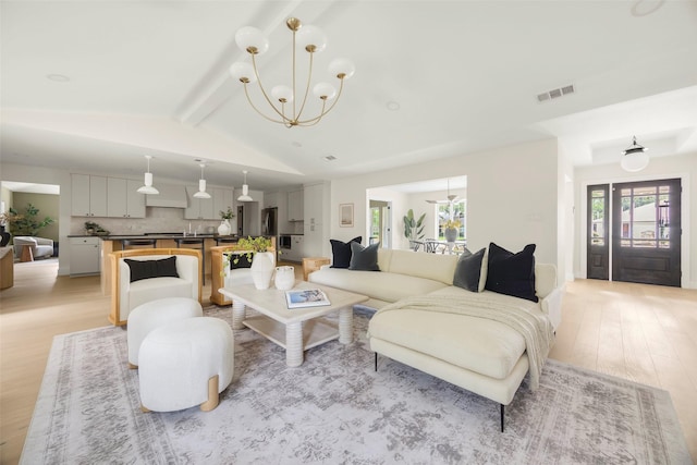 4508 Thunder Rd, Dallas, TX 75244 - living area with light wood-type flooring and a chandelier