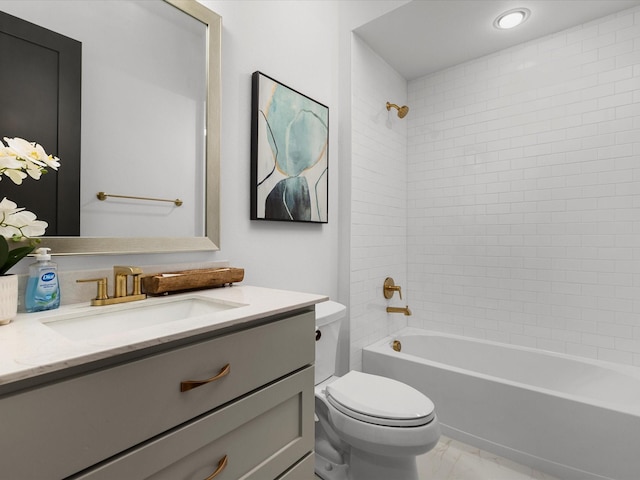 full bath featuring vanity, toilet, shower / washtub combination, and marble finish floor