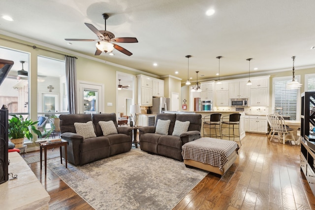 308 Dunlin Ln, Coppell, TX 75019 - living area with a ceiling fan, ornamental molding, recessed lighting, and light wood-style floors