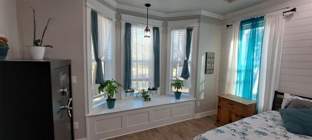12890 County Road 463, Tyler, TX 75706 - bedroom featuring wood finished floors, ornamental molding, and baseboards