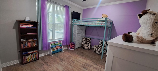 12890 County Road 463, Tyler, TX 75706 - bedroom with ornamental molding, wood finished floors, baseboards, multiple windows, and ceiling fan