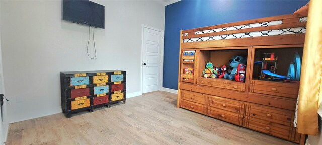 12890 County Road 463, Tyler, TX 75706 - bedroom featuring wood finished floors and baseboards