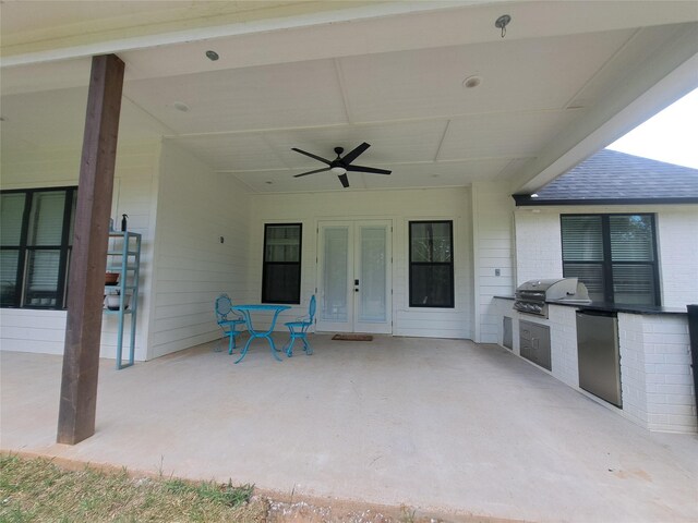 12890 County Road 463, Tyler, TX 75706 - view of patio / terrace with an outdoor kitchen, french doors, a grill, and ceiling fan